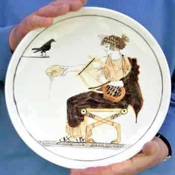 Apollo feeding a raven whole grain