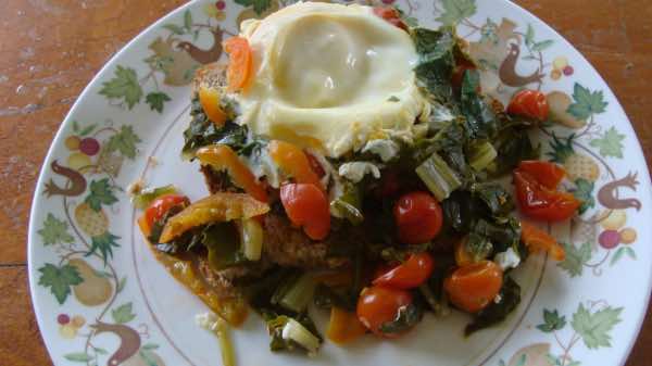 Eggs Florentine with added arugula for brain food. Eggs Florentine with added arugula for brain food.