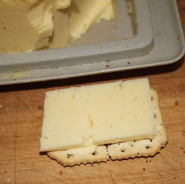 Biscuits and cheese, on their own, will contribute to an unhappy tum. Biscuits and cheese, on their own, will contribute to an unhappy tum.