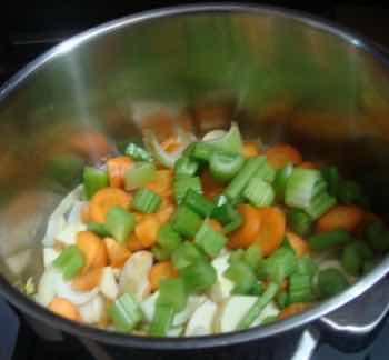 Bernie's beetroot soup raw vegetables in pot