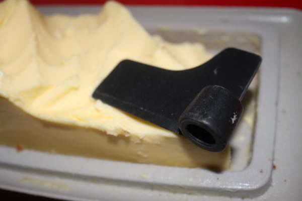Butter the bread machine paddle. Butter the bread machine paddle.