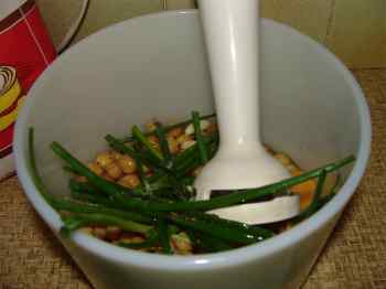 Chickpea ingredients for falafel in a bowl. Chickpea ingredients for falafel in a bowl.