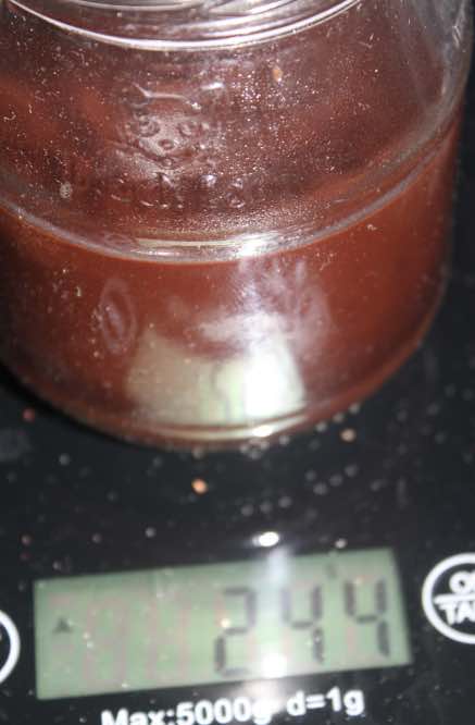 Cocoa concentrate in glass bottle Cocoa concentrate in glass bottle