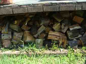 Split logs stacked for firewood.