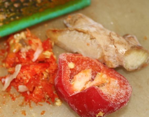 Grate the frozen peppadew and ginger for the latkes