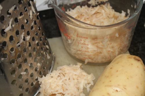 Grating new potatoes