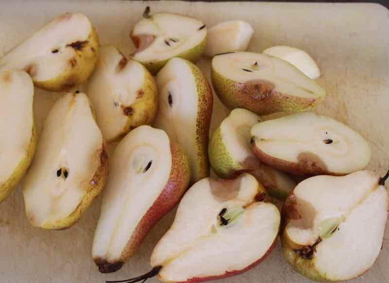 Halved rotten Perry pears. Halved rotten Perry pears.