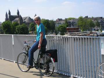 Helen on her bike on the Maas bridge. Helen on her bike on the Maas bridge.
