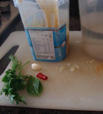 Hummus ingredients include garlic, chili and parsley Hummus ingredients include garlic, chili and parsley
