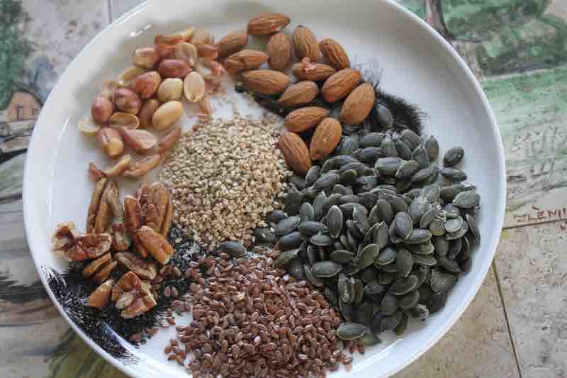 Magnesium from nuts and seeds is required for many bodily reactions.