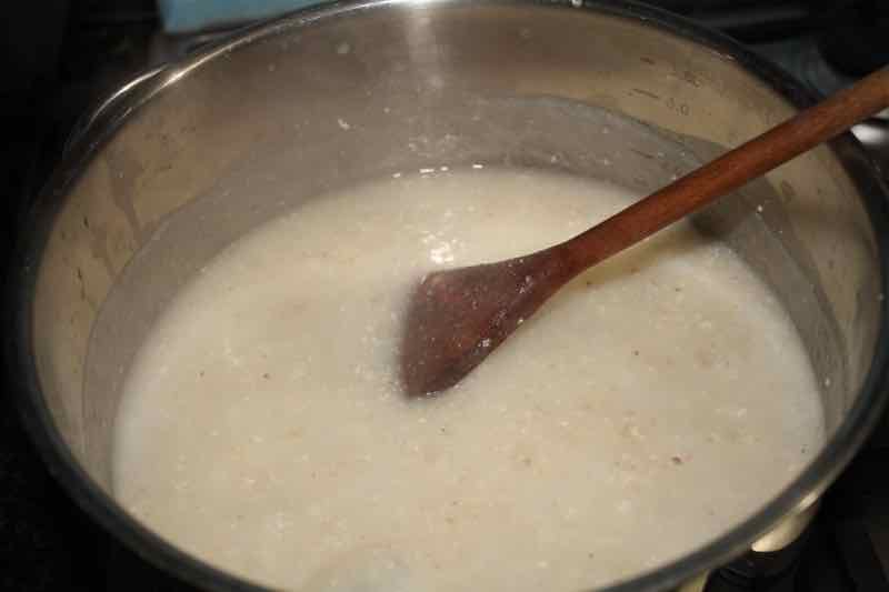 Mealie-meal added to boiling water. Mealie-meal added to boiling water.