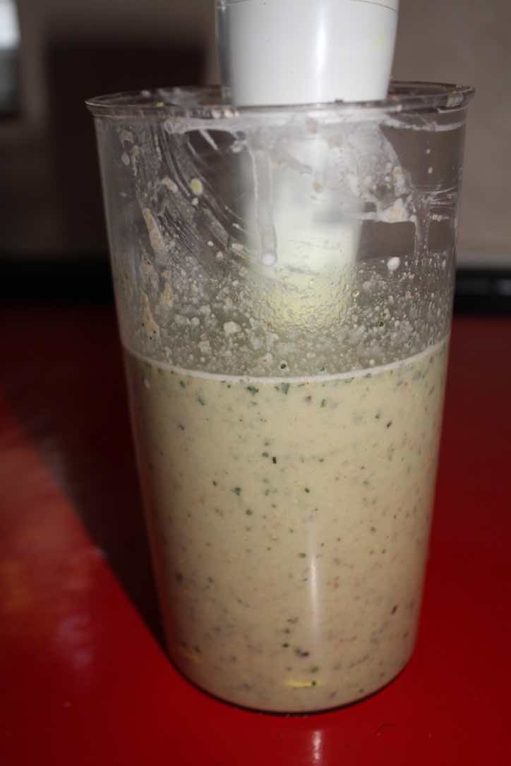 Oats milk smoothie being blended. Oats milk smoothie being blended.