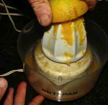 Orange juice using an electric squeezer Orange juice using an electric squeezer