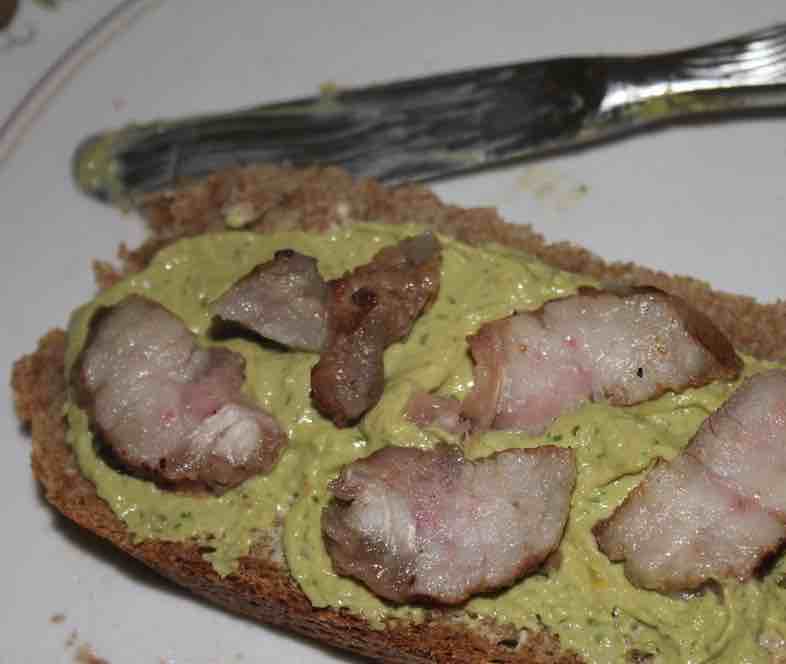 Piquant tahini sauce on real bread.