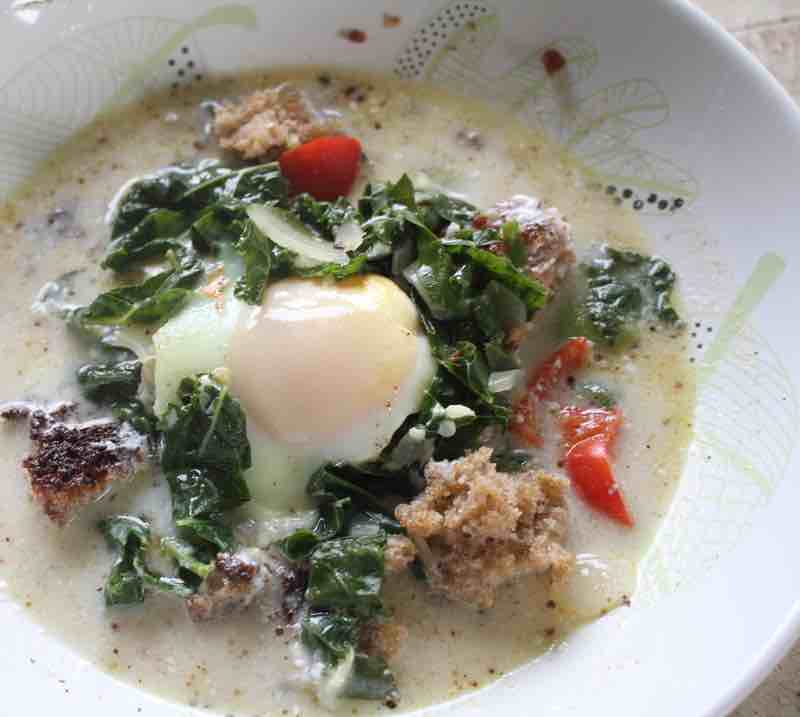 Poached eggs on fried sourdough bread.