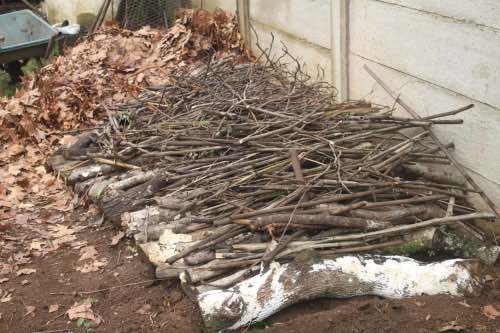 Raised compost bed; laying the base Raised compost bed; laying the base