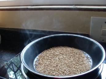 Roasting cumin seeds; can you see the vapour? Roasting cumin seeds; can you see the vapour?