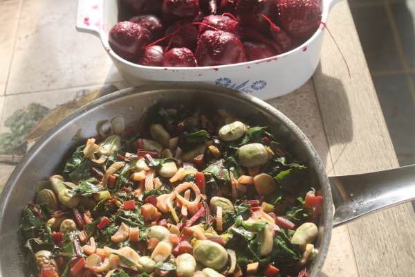 Sauteed beet tops and broad beans