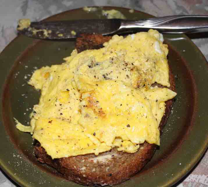 Scrambled egg on pan-fried toast.