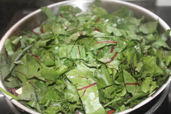 Sliced beet greens on broad beans and fennel