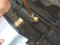 Solar tubes fittings 1 shows the first part of solar geek Bernard Preston attaching copper pipes to the passive solar water heater.