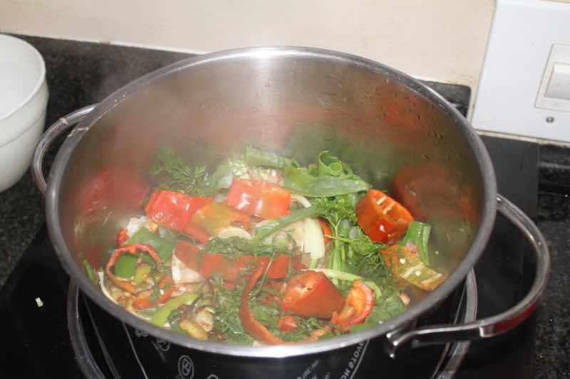 Spicy Thai curry soup in pot. Spicy Thai curry soup in pot.