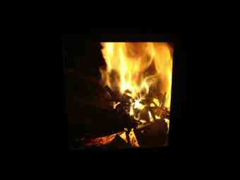 The woodstove flames after 5 minutes.