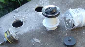 Use a hole saw to fit the waste plug Use a hole saw to fit the waste plug