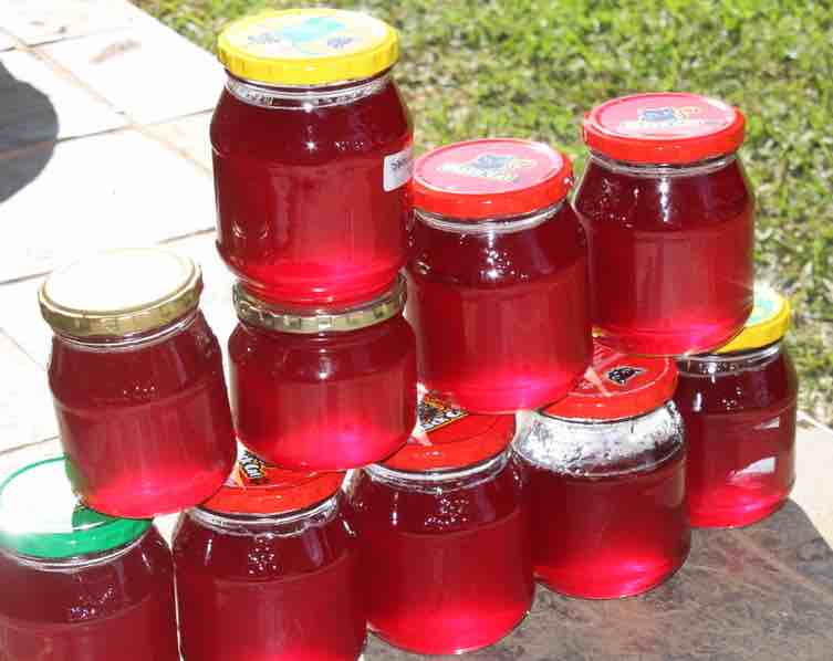 Cherry guava jelly in bottles.