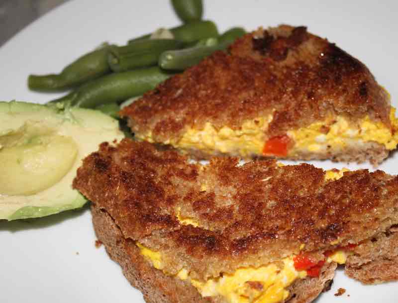 Toasted egg sandwich with avocado and broad-beans for supper. Toasted egg sandwich with avocado and broad-beans for supper.